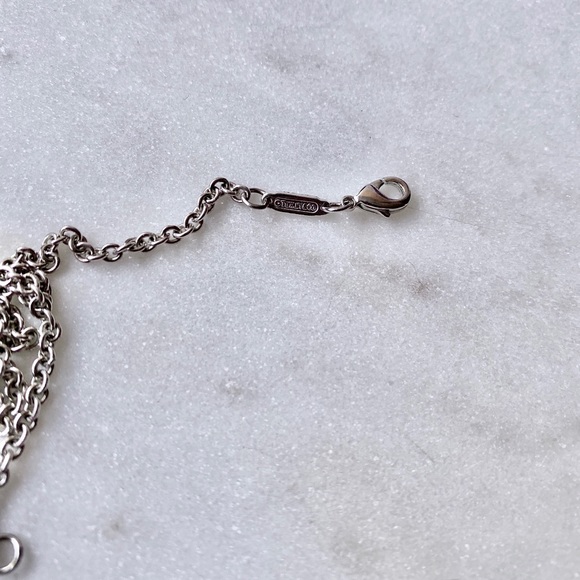 TIFFANY & CO. LARGE NOTES ROUND PENDANT NECKLACE - Picture 7 of 7